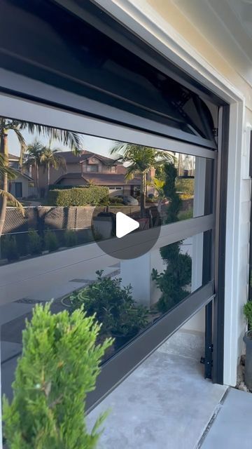 Optimize - Garage Door on Instagram: "Homes Curb appeal goes 🔥  With New Glass Garage Doors ✍🏻   Request a garage door quote  @optimizegaragedoors 📲   #homeinspiration #decohome  #luxuryhome #homedesign  #contractors #car #instagood" Clear Garage Door Patio, Transparent Garage Door, Garage Glass Doors, Glass Garage Doors In House, Garage Door In Kitchen, Modern Garage Design Interior, Garage Man Door, Modern Garage Doors Ideas, Garage Doors Glass