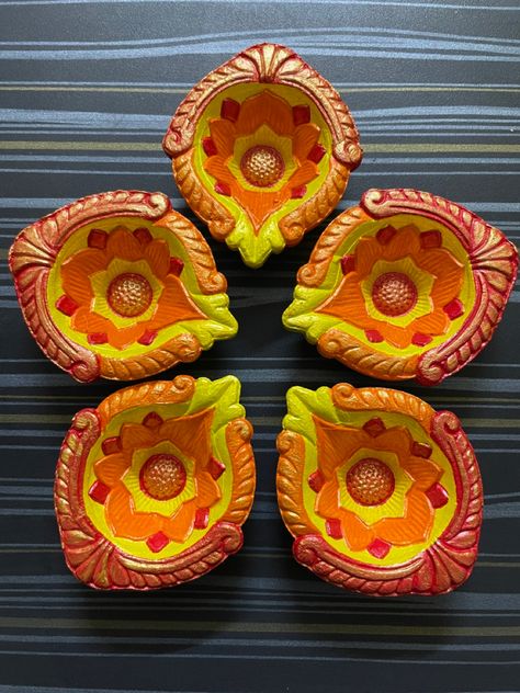 Dm on instagram for orders @utkalp_crafts Deepak Decoration Ideas, Hand Painted Diyas, Diya Paintings Acrylic Ideas, Diyas Painting, Diya Paintings For Diwali, Diyas Decoration, Diya Paintings, Diy Diyas, Diya Making