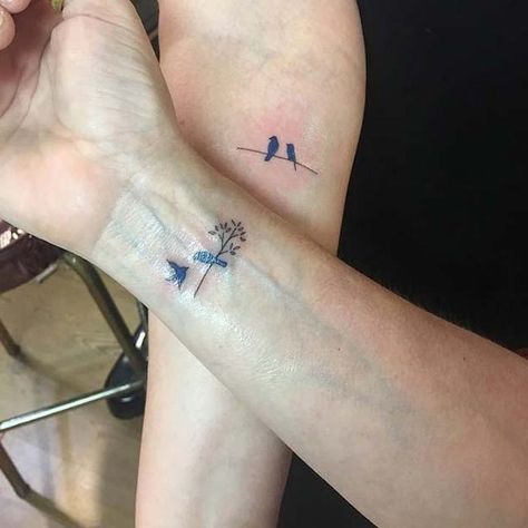 mother-daughter-tattoo-ideas-birds-on-tree-branch-wrist-tattoos Mother Daughter Infinity Tattoos, Mother And Daughter Tattoos, Bluebird Tattoo, Tattoo On Wrist, Mother Daughter Tattoo, Mom Daughter Tattoos, Birds On Branch, Tiny Tats, Daughter Tattoo