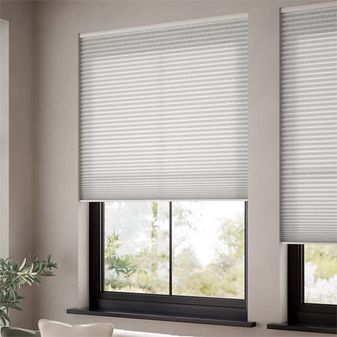 In a beautifully cool soft grey tone, the DuoLight Cordless Strie Soft Grey Pleated Blind is just the thing to add a touch of texture to your interior scheme.      Its subtle striped design and light filtering fabric will give your space a lovely glow and inviting look.      Our safest blind, with no cords dangling down it's perfect for contemporary or traditional schemes, where the sleek cordless design will give your bedroom, living room or kitchen a modern look at your window. White Faux Wood Blinds, Beautiful Blinds, Faux Wood Blinds, Thermal Blinds, Pleated Blind, Wood Blinds, Garden Windows, Venetian Blinds, Wooden Blinds