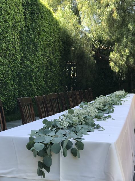 Silver dollar eucalyptus and million star baby’s breath garland set this 32 ft. Long wedding banquet table! Wedding Decor Eucalyptus, Garden Entertaining, Eucalyptus Wedding Decor, Eucalyptus Centerpiece, Wedding Table Garland, Long Table Wedding, Table Garland, Dollar Eucalyptus, Silver Dollar Eucalyptus