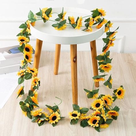 Amazon.com: 2 Pack Artificial Sunflower Garland Silk Sunflower Vine Artificial Flowers Green Leaves Fabric Floral Head Fake Sunflowers Vine for Wedding Table Home Craft Party Decoration : Home & Kitchen Floral Arch Wedding, Hanging Vines, Wedding Wall, Leaf Flower, Floral Craft, Flowering Vines, Floral Vine, Flower Garlands, Fake Plants