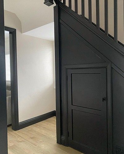 Black Skirting Boards, Black Woodwork, Grey Skirting Boards, Black Skirting, Staircase Banister Ideas, Black Banister, Aesthetic Colour Palette, Black And White Hallway, Stairs Skirting