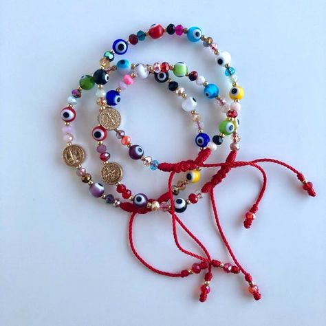 Ojo Bracelets Diy, Handmade Red Evil Eye Bracelet Gift, Ojo Bracelets, Adjustable Red Bracelets With Evil Eye, Red Resizable Evil Eye Bracelet, Evil Eye Jewelry Bracelet, Adjustable Red Evil Eye Bracelet, Hand-strung, Lucky Charm Bracelet, Good Luck Bracelet