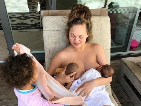 Chrissy Teigen Issued Her Best Clapback Yet After Sharing This Breastfeeding Pic | Glamour Mother Feeding Baby, Emrata Instagram, Twins Instagram, Breastfeeding Twins, Emma Heming, Mother Feeding, World Breastfeeding Week, Breastfeeding Week, Nursing Mom