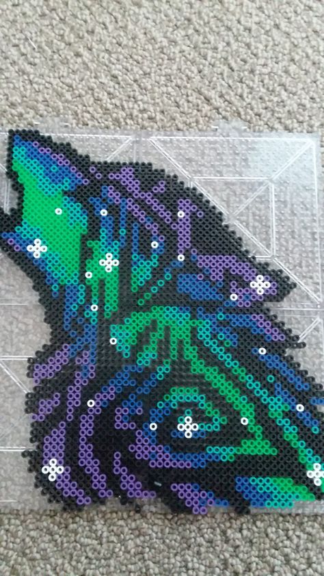 Purple Blue Green Galaxy Wolf  made of Perler Beads Excision Kandi, Perler Bead Crafts, Butterfly Blanket, Kandi Necklace, Galaxy Wolf, Blue Wolf, Perler Creations, Piskel Art, Melty Bead Patterns