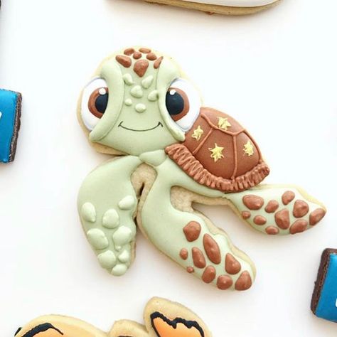 Frosted Cookiez (@frostedcookiez) • Instagram photos and videos...sea turtle Gift Party Ideas, Turtle Baby Shower Theme, Decorate Cookies With Royal Icing, Boy Baby Shower Cookies, Dessert Animals, Nemo Baby, Baby Shower Desserts Boy, Baby Shower Cakes Neutral, Turtle Baby Shower