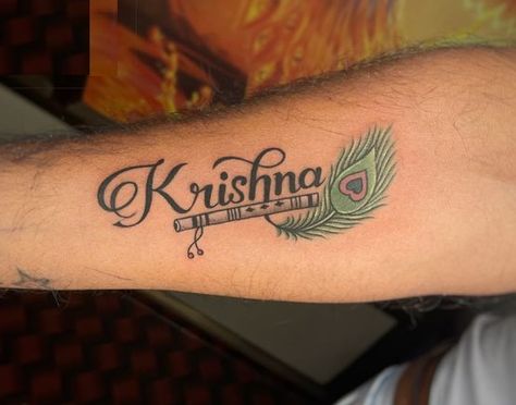 Krishna Name Tattoo Krishna Name Tattoo, Mor Pankh Tattoo, Tattoo Krishna, Krishna Name, About Krishna, Flute Tattoo, Krishna Names, Trishul Tattoo Designs, Krishna Tattoo