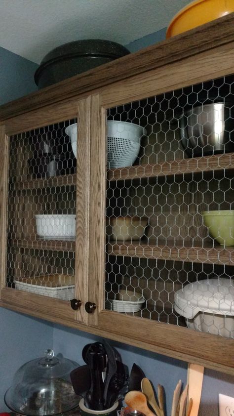 Cabin Cupboard Ideas, Chicken Wire Furniture, Chicken Wire Cabinet Doors, Reuse Kitchen Cabinets Ideas, Chicken Decor Kitchen Farmhouse Style, Chicken Wire Cabinets Kitchen, New Cabinet Doors On Old Cabinets, Chicken Wire Kitchen, Cabin Cabinets