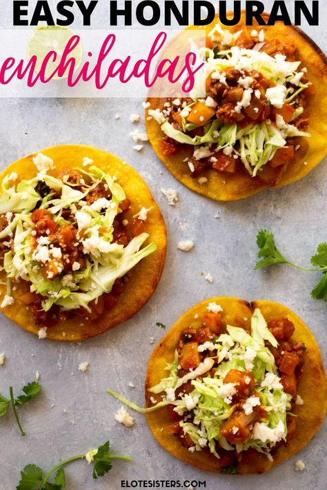 These Honduran enchiladas are similar to Mexican tostadas. Full of yummy flavors, these ground beef and potato tostadas are served over fried tortilla shells and covered with cabbage slaw and Queso fresco. This is a super easy dinner recipe that everyone will love. #dinner #recipes #honduranfood #latinfood #mexicanfood Honduran Tacos, Salvadoran Enchiladas, Potato Tostadas, Easy Honduran Recipes, Honduran Soup Recipes, Honduran Enchiladas Recipe, Traditional Honduran Recipes, Authentic Honduran Recipes, Honduran Enchiladas