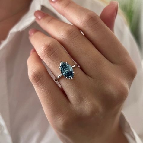 2 Carat Marquise Fancy Vivid Blue Diamond Engagement Ring / Colored Diamond Solitaire Ring / White Gold Marquise Cut Blue Diamond Ring #marquiseengagementring #marquisediamond #marquisdiamond Marquise Sapphire Ring, Marquise Solitaire Engagement Ring, Marquise Rings, Engagement Rings Blue, Fancy Engagement Rings, Blue Diamond Engagement Ring, Ring Cuts, Blue Moissanite, Blue Diamond Ring