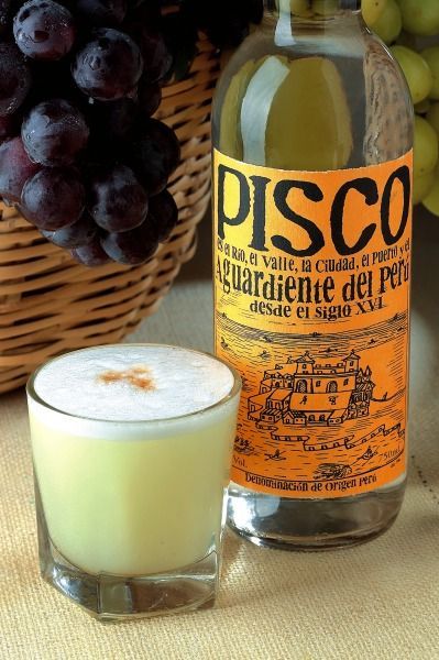 Pisco Sours are Peru's National drink and a truly undiscovered phenomenal tasty drink! If you don't have the bitters, no worries, I like to top it off with cinnamon. Ceviche & Pisco Sours are a perfect match. Peruvian Independence Day, Peruvian Drinks, Famous Cocktails, Peruvian Cuisine, Pisco Sour, Sour Cocktail, Peruvian Recipes, Peru Travel, Latin Food