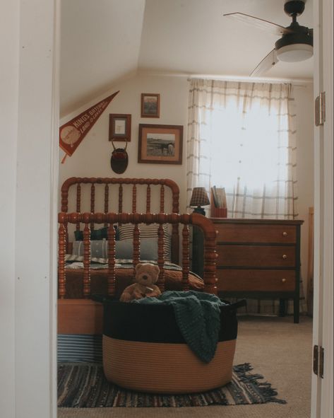 Vintage style little boys room with a rag rug, green dresser, vintage art, and plaid curtains Vintage Farm Bedroom, Board And Button With Wallpaper, Antique Kids Room, Farmhouse Toddler Boy Room, Cottagecore Boys Room, Antique Boys Room, Vintage Americana Nursery, Vintage Boy Bedroom, Cottage Core Toddler Room