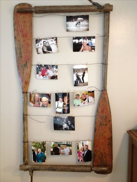 Oar photo frame #upcycle  #repurpose use large frames..add small oars. like memories twine for photos Distressed Headboard, Brewery Ideas, Photo Hanger, Oar Decor, Paddle Ideas, Wooden Oars, Cottage Chairs, Canoe Paddles, Simple Bookshelf