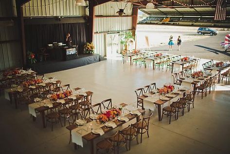 How fun! A wedding reception in an airplane hangar! Rectangle Seating Arrangement, Rectangle Tables Wedding Reception, Rectangle Table Wedding Layout, Hangar Wedding Reception, Hangar Wedding Decor, Wedding Table Layouts Floor Plans, Airplane Hangar Wedding Reception, Wedding At Airplane Hanger, Rectangle Wedding Tables