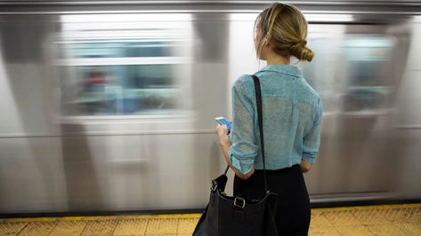 (Credit: Getty Images) Working Girls, Mom Brain, Affirmative Action, Changing Jobs, Strong Body, Working Mother, Woman Standing, Working Moms, Train Station