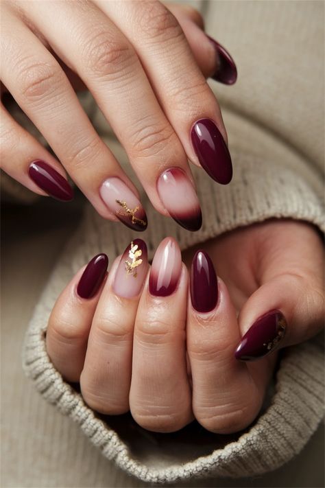 Embrace the cozy vibes of autumn with these elegant gel nails that showcase the perfect fall nail ideas. Featuring rich burgundy hues, delicate gold accents, and a chic matte finish, this design captures the essence of the season. Whether you're enjoying pumpkin spice lattes or cozying up by the fire, these nails will elevate your fall look. Get inspired and bring a touch of autumn to your manicure! #FallNailIdeas #GelNails #AutumnManicure Cream And Burgundy Nails, Maroon Autumn Nails, Red Wine Nails Design Burgundy, Fall Nails With Gold Accent, Fall Builder Gel Nails, Fall Wine Nails, Autumn Nails Biab, Maroon Fall Nail Designs, Latte Nail Ideas