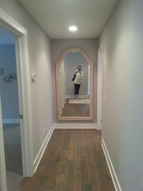 Love the big mirror at the end of the hallway--really extends the look of the hallway and brightens things up Mirror At End Of Hallway, End Of Hallway Decor, End Of Hallway, Hallway Design Ideas, Hallway Vintage, Hallway Ideas Diy, Wallpaper Hallway, Farmhouse Hallway, Hall Mirror