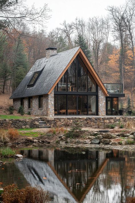 Stone cabin reflecting in a tranquil pond, embraced by trees. From rustic mountain retreats to urban lofts with views worth a million bucks (or maybe we’re just out of breath from the altitude), Colorado homes have their very own kind of charm. A Frame Cabin Design, Small Mountain Home Exterior, Colorado Cabin Aesthetic, Cabin Mountain View, Mountain Cabin Aesthetic, Small Mountain Homes, Chalet Floor Plans, Cabin In The Woods Aesthetic, Mountain Home Plans