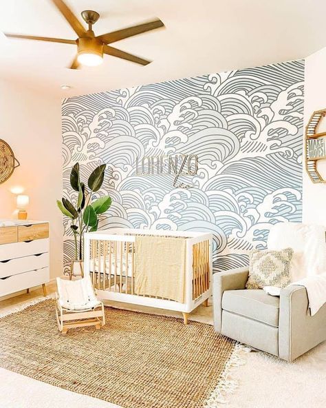 22 Calming Coastal Nursery Decorating Ideas » Lady Decluttered Baby Boy Nursery Wave Wallpaper, Nursery Ideas Ocean Sea Theme, Waves Nursery Wall, Waves Wallpaper Nursery, Ocean Wave Nursery, Modern Ocean Themed Nursery, Waves Nursery Theme, Wave Wallpaper Nursery, Surf Nursery Decor