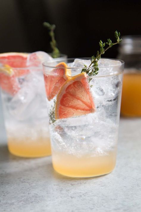 This sparkling grapefruit shrub mocktail combines fresh grapefruit, apple cider vinegar, and sparkling water for a refreshing anytime beverage. Drinking Shrubs, Fruit Shrubs, Shrub Drink, Switchel Recipe, Fruit Shrub, Shrub Recipe, Urban Gardening Ideas, Virgin Cocktails, Unfiltered Apple Cider Vinegar