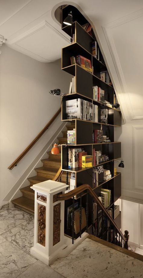 Fun bookcase in a stair well. Not a fan of the lights and overall it clashes with the rest of the finishes. Still very cool. Home Libraries, Design Del Prodotto, Style At Home, Home Library, Modern Office, Design Case, Home Fashion, 인테리어 디자인, My Dream Home