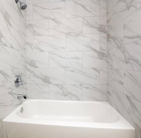 Marble Tile Bathtub, Redoing Bathroom, Master Restroom, Basement Tile, Tile Around Bathtub, White Marble Tile Bathroom, Marble Bathtub, Marble Tile Bathroom, Bathroom Tub Shower