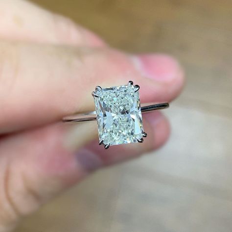 Hamra Diamonds on Instagram: “Our client requested to have her newly chosen radiant set in a solitaire setting with double claw prongs on each corner adding extra design…” Radiant Engagement Ring Double Prong, Double Prong Radiant Engagement Ring, Radiant Moissanite Engagement Ring, Radiant Diamond Rings, Radiant Engagement, Radiant Moissanite, Prong Engagement Rings, Engagement Rings Twisted, Silver Wrap Ring