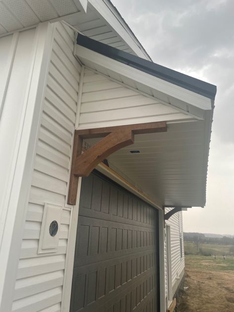 Garage Door Eyebrow, Cedar Corbels Exterior, Garage Eyebrow, Corbels Exterior, Faux Wood Garage Door, Wood Garage, Garage Roof, Wooden Corbels, Wood Garage Doors