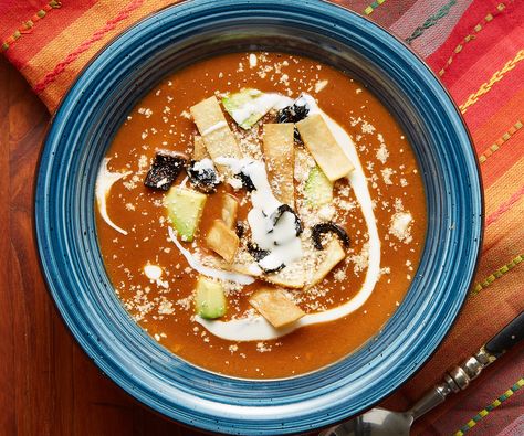 It's so cold out! Going to curl up with a bowl of this Tarascan Soup for a cozy Friday night. It has a creamy tomato, ancho chile, and pinto bean base with garnishes of flash-fried anchos and tortilla strips, avocado, and Mexican style cream and queso Cotija. Tarascan Soup, Pati's Mexican Table Recipes, Patti Jinich Recipes, Patis Mexican Table, Pinto Bean Soup, Pati Jinich, Pinto Bean, Tortilla Strips, Mexican Table