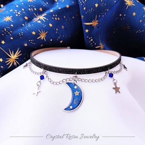 Hello, we have for you our new celestial galaxy chokers with cute crescent moon and stars! Available in 2 options: 1. 2,5cm, darker moon with gold stars and dark blue beads 2. 2cm, gradient moon, with light blue beads 3. you can choose other moon from picture if you'll need personalization, feel free to write to me! I can make other colors and I have more available moons, made on order too :) Choker is made of sparkling faux leather in dark grey color. All metal elements are made by surgical ste Space Themed Accessories, Moon Choker, Moon Fashion, Star Choker, Emo Jewelry, Moon Accessories, Space Jewelry, Layered Chokers, Moon Gifts