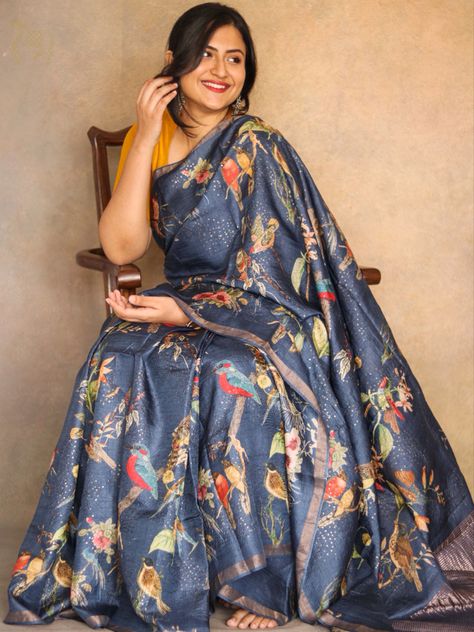 This beautiful blue tussar saree has sequins and beautiful bird and floral prints all over. #sarees #sareelove #sareedraping #sareelover #sareecollection #sareesoverseas #sareesofinstagram #tussar #tussarsaree #indianwear #sareeshopping #chennai #mylapore #traditionalwear #sareeaddict #sareeonline #rasvriti Printed Sarees Latest, Latest Silk Sarees, Tussar Saree, Floral Print Sarees, Saree Floral, Floral Saree, Indian Flowers, Beautiful Sarees, Half Saree Designs