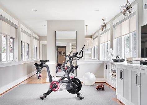 Sleek gray and white dallas tx home gym designed by S B Long Interiors using Bolon floor covering, solar shades and contrasted paint in Benjamin Moore Simply White and Revere Pewter // neutral paint color benjamin moore // paint colors for home gym // paint colors for whole house Gym Paint Colors, Home Gym Paint Colors, Small Home Gyms, Small Home Gym Ideas, Home Gym Ideas, Small Home Gym, Exercise Room, Contemporary Craftsman, Gym Room At Home