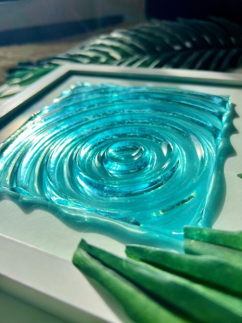 Water ripple art painting - One of a kind Ocean art Handmade out of resin. Frame can be hang on the wall and also stand by it self. The painting is 20 x 20 cm Please visit my instagram @frokenhognert for other items or custom orders. Resin Water Art, Water Resin Art, Ripple Painting, Ocean Sculpture, Ocean Mirror, Glass Art Work, Resin Ocean Art, Water Mirror, Abstract Resin Art