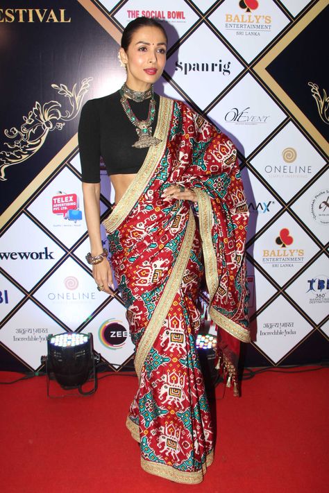 Love traditional weaves? You have to add Malaika Arora’s patola sari to your collection | Vogue India | Vogue Closet Patan Patola Saree, Bollywood Sarees Online, Traditional Silk Saree, Malaika Arora, Patola Saree, Double Weave, Silk Saree Blouse Designs, Satin Saree, Art Silk Sarees