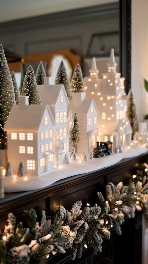 Learn how to achieve a festive holiday look with black and white Christmas decor ideas. From tree ornaments to table settings, get inspired this season! All White Christmas Village, Minimalist Christmas Village, Black Christmas Village, Snowy Christmas Decor, Christmas Decor Ideas Minimalist, White Christmas Aesthetic, Black And White Christmas Decor, White Christmas Decor Ideas, Creative Wrapping