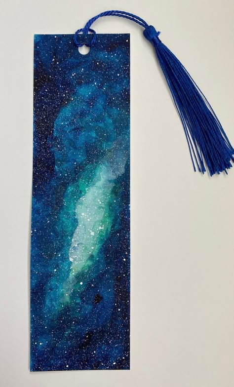 Galaxy Bookmark Watercolor, Painting On Bookmarks, Watercolor Bookmarks Ideas Aesthetic, Cool Bookmark Ideas, Bookmarks Handmade Watercolor, Painted Bookmarks Acrylic, Cute Bookmarks Diy, Unique Bookmarks Handmade, Handmade Bookmark Ideas