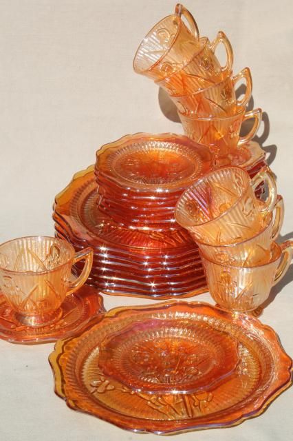 vintage marigold iridescent carnival glass dishes set iris & herringbone plates, cups & saucers Orange Carnival Glassware, Cool Dishes Set, Cute Dishes Sets, Glassware Display, Dishes Sets, Vintage Dishes Antiques, Carnival Glass Vintage, Carnival Glassware, Vintage Dishware