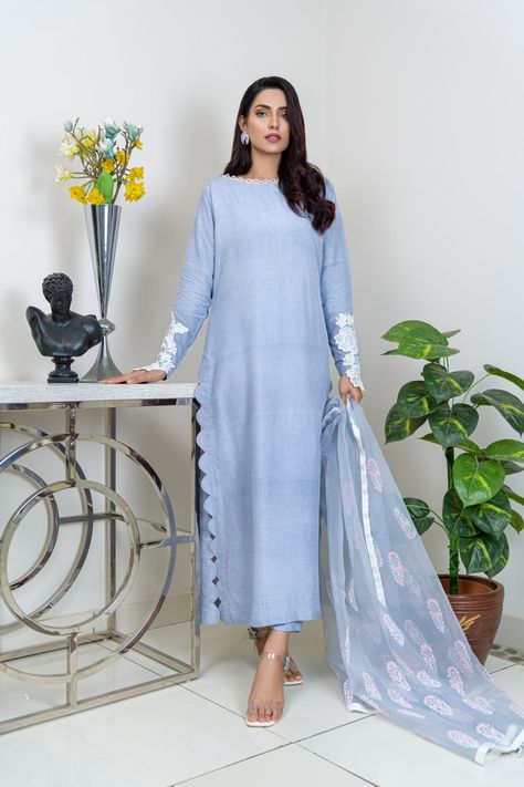 Stand out in a sea of dresses with Shireen Lakdawala's Designer Blue Dresses. Made with high-quality fabric and featuring stunning details, these designer dresses are perfect for girls of all ages. Shop now for the ultimate elegance! Silk Long Shirt Designs Pakistani, Long Kurti Pant Design, Pakistani Pant Kurti Design, Plain Fabric Suit Designs, Plain Dress With Lace Design Pakistani, Design Of Plain Suits, Long Shirts Design Pakistani, Pakistani Block Print Suits, Cutwork Dresses Pakistani