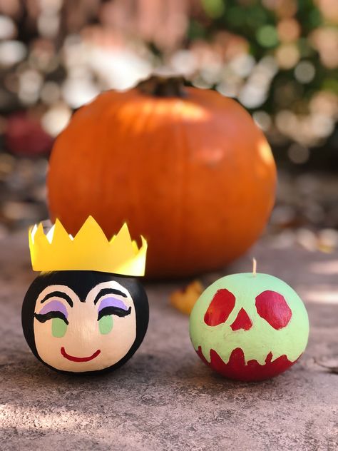 These are actually painted gourds, to look like the Evil Queen and poison apple from Snow White. | Evil Queen Pumpkin | Poison Apple Pumpkin | Painted Disney Pumpkins | Disney Pumpkins Snow White Pumpkin Painting, Snow White Pumpkin Decorating Ideas, Evil Queen Pumpkin, Snow White Pumpkin, Snow White Witch Pumpkin, Easy Pumpkin Painting Ideas Disney, Pumpkin Painting Ideas Poison Apple, Poison Apple Pumpkin Painting, Snow White Apple Pumpkin