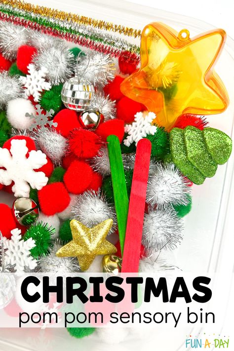 A dry, soft, sparkly sensory bin perfect for Christmas sensory play with preschool, pre-k, and kindergarten kids this holiday season. They can explore math, fine motor, and sensory skills as they play. Click on the Fun-A-Day.com link for more information. Christmas Sensory Bags For Toddlers, Pom Pom Sensory Bin, Christmas Sensory For Toddlers, Preschool Christmas Sensory Bin, Christmas Sensory Bin Toddlers, Christmas Sensory Bin Preschool, Preschool Experiences, Christmas Sensory Activities, Nursery Activity Ideas