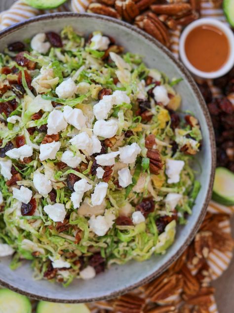 Shaved Brussels Sprouts Salad with Cranberry Vinaigrette Brussel Sprouts Cranberries, Shaved Brussel Sprout Salad, Cranberry Vinaigrette, Salad With Cranberries, Shaved Brussel Sprouts, Brussels Sprouts Salad, Jellied Cranberry Sauce, Sprout Salad, Pecan Salad