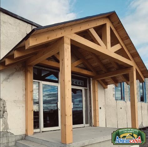 Setting the stage for something incredible! 🪵 This timber frame entrance hints at the welcoming charm that will soon bring this commercial building to life. Wood accents like these elevate any project, residential or commercial! Post And Beam Entrance, Log And Timber Homes, Timber Homes, Timber Frame Homes, Commercial Building, Timber House, Built To Last, Wood Beams, Wood Accents