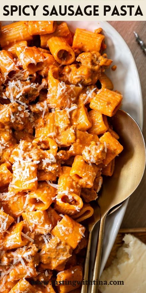 Spice up your dinner routine with this Spicy Sausage Pasta recipe! This dish is full of flavor with rigatoni pasta, fiery spicy Italian sausage and hot Calabrian chili peppers. With a bold kick and a ton of flavor, this is going to be one of your new favorites! Spicy Rigatoni Pasta Bucca, Spicy Sausage Rigatoni Pasta, Pasta With Italian Sausage Recipes, Calabrian Chili Recipes, Spicy Italian Sausage Pasta, Cajun Pasta With Sausage, Hot Italian Sausage Recipes, Hot Sausage Recipes, Sausage Penne Pasta