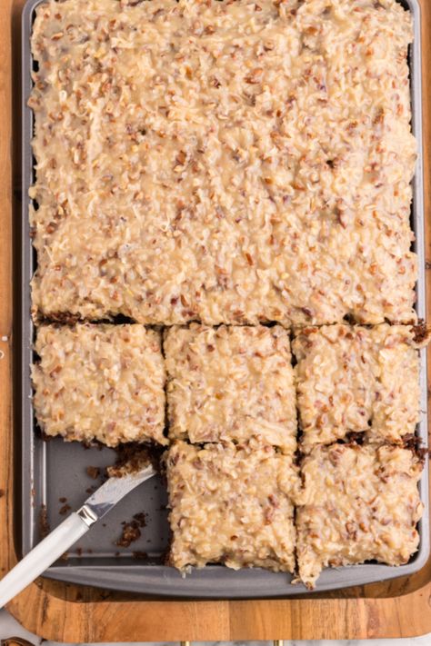 German Chocolate Sheet Cake! An easy German Chocolate sheet cake recipe with a spiffed-up cake mix base and homemade caramel, pecan and coconut icing. German Chocolate Sheet Cake, German Chocolate Icing, German Chocolate Frosting, Chocolate Sheet Cake Recipe, Homemade German Chocolate Cake, Chocolate Cake Mix Recipes, South Your Mouth, America Cake, Coconut Icing