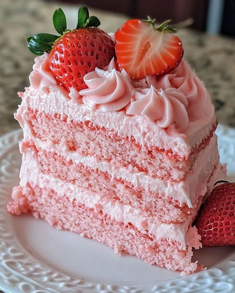 Barbie Pink Strawberry Cake 🎀🍰 Ingredients: - 1 box (15.25 oz) strawberry cake mix - 1 cup water - 1/2 cup vegetable oil - 3 large eggs - 1 cup fresh strawberries, pureed - 1 teaspoon vanilla extract - Pink frosting (store-bought or homemade) Instructions: 1. Preheat your oven to 350°F (175°C). Grease and flour two 9-inch round cake pans. 2. In a large bowl, combine the strawberry cake mix, water, vegetable oil, and eggs. Mix until well combined. 3. Gently fold in the strawberry puree and v... Box Strawberry Cake, Pink Strawberry Cake, Ibs Friendly Food, Yams Recipe, Strawberry Cake Mix, Pink Frosting, Strawberry Puree, Pink Strawberry, Round Cake