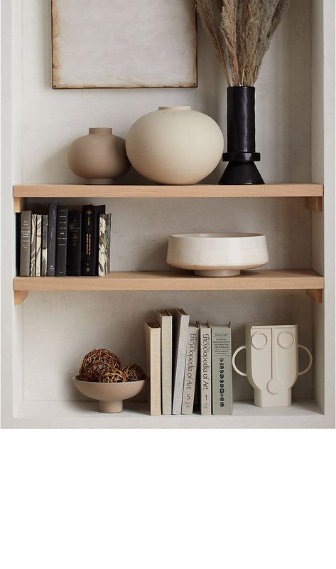 Shop for The Earthy Neutral Shelfie at Crate and Barrel. Browse a variety of furniture, housewares and decor. Order online. Crate And Barrel Style, Natural Wood Console Table, Credenza Decor, Shelf Decor Living Room, Styling Shelves, Bookshelf Styling, Wood Bookcase, Wood Console Table, Cabinet Decor