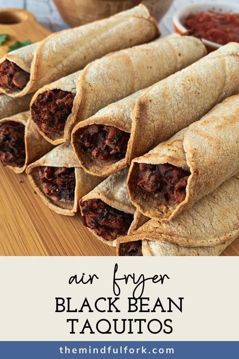 Air Fryer Black Bean Taquitos stacked on a wooden board. Taquitos Vegetarian, Black Bean Taquitos, Bean Taquitos, Easy Bean Recipes, Nutritious Lunch, Healthy Party Snacks, Bean Snacks, Fried Beans, Spicy Appetizers