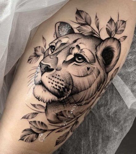 Lion Tattoo for Women: 20 Graceful and Empowering Designs - besttattoo.wiki - Unveiling Exquisite Ink Art Lion Tattoo For Women, Tattoo Bein Frau, Lioness And Cub Tattoo, Lion And Lioness Tattoo, Lion Tattoo On Thigh, Lioness Tattoo Design, Female Lion Tattoo, Lioness Tattoo, Lion Head Tattoos