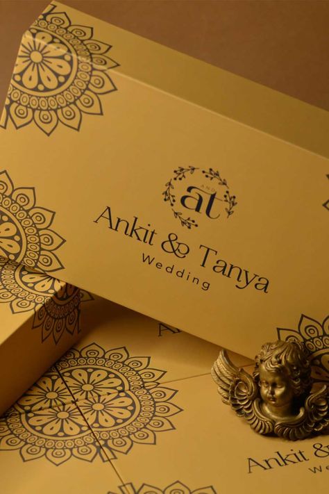 Indian weddings are milestone events for families that are meant to be remembered for generations. The sheer number of guests invited often ranges in thousands. We make specialized gift boxes for Indian Weddings which can be customized to hold not just elaborate Indian dresses like Saris but also to hold any other thoughtfully curated gifts. Choose from hundreds of special papers and materials that will truly make a mark in every marriage. #luxurybox #luxurysareebox #sareebox Luxury Saree, Luxury Indian Wedding Invitations, Chocolate Box Packaging, Luxury Indian Wedding, Cookies Box, Dress Box, Chocolate Boxes, Design Saree, Cosmetic Logo